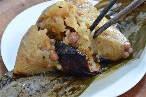Sticky Rice Steam With Pork And Salt Egg In Banana Leaf Of Chinese