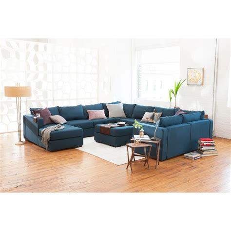 Now, two people on the balcony and two on the ground, rest the couch on its arm so its standing. Wrap-Around Modular Sectional Couch | Modular sectional ...