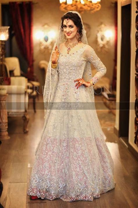 The process of designing a custom wedding gown is long and requires vision, patience, and a true understanding of what you want—along with ample buying a dress based on how you think your body will look on your wedding day is a mistake. 2016-2017 Dulhan dresses | Indiana