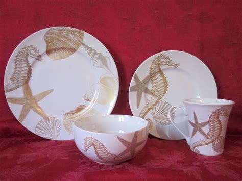 Each set includes service for four people including four dinner plates, four salad plates, four bowls, and four mugs. 222 fifth coastal life gold seahorse nautical marine ...