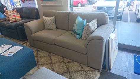 15 ways to style a grey sofa in your home décor aid. What colour/tone sofa fabric for neutral living room with grey tile? | Houzz AU