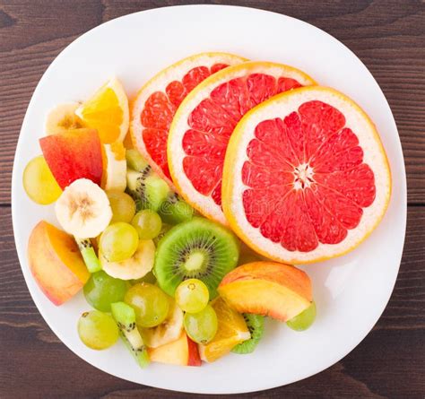 Assortment Of Sliced Fruits On Plate Stock Image Image Of Food