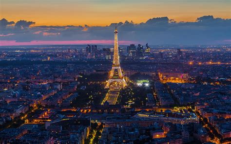 17 Gorgeous Photos Of The Eiffel Tower At Night Travel Leisure
