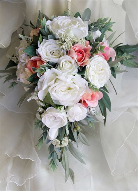 Artificial wedding bouquets that look so real, even though they are fake wedding bouquets. Teardrop cascade bridal bouquet wedding flowers artificial