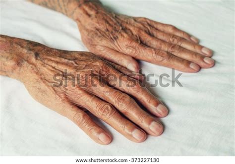 Old Mans Hand Resting On White Stock Photo Edit Now 373227130