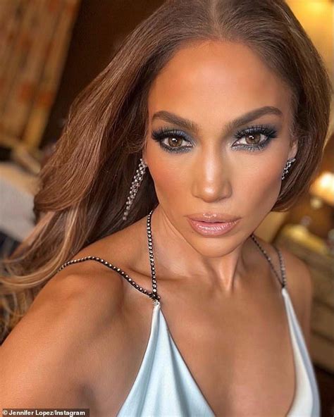 Jennifer Lopez Shows Off Her Curves As She Models Jlo Beauty Makeup Jlo Glow Blue Dress