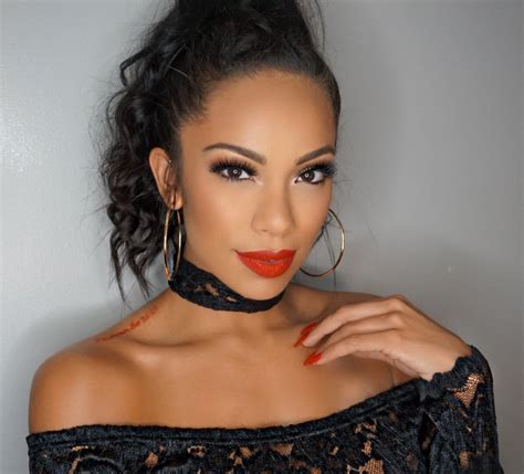 Erica Mena Shows Off Her Secret For Keeping Her Glow This Summer