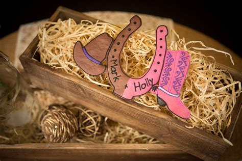 Cowboy theme birthday party decorations | the country chic cottage. Horseshoe, cowboy hat and boot centerpiece country western ...