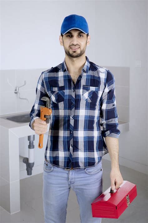 italian plumber showing thumb up in the kitchen stock image image of renovation hand 115424847