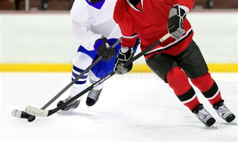 Ice Hockey Players In The Competitive Match In The Rink Stock Photo