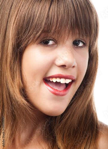 Portrait Of The Beautiful Smiling Teenage Girl Stock Photo And
