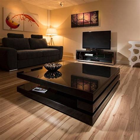 The average height of a coffee table is anywhere from 16 to 20 inches, and usually somewhere in between since the height of most seat cushions on sofas and loveseats is about 18 inches. Top 30 of Big Black Coffee Tables