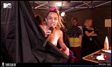 Miley Cyrus Lets Hard Nipple Fly Free With Epic Wardrobe Malfunction