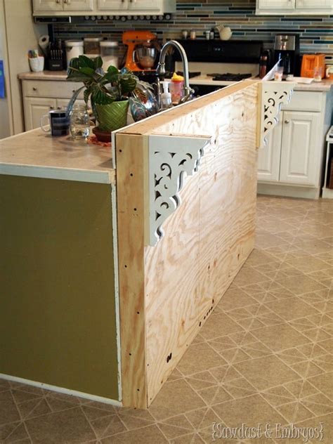The latter option tends to offer more flexibility because the island can have two levels. DIY Corbels for a Breakfast Bar - Reality Daydream
