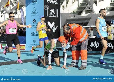 Exhausted Runner At The Finish Line Of The Valencia 2019 Marathon