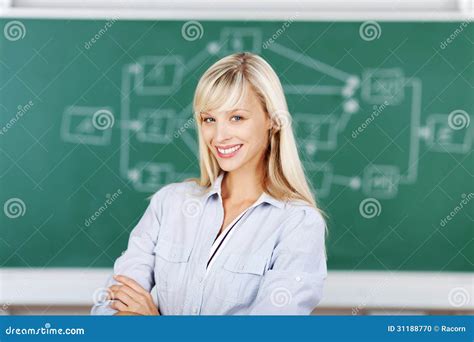 Female Teacher With Arms Crossed Stock Photo Image Of Attractive