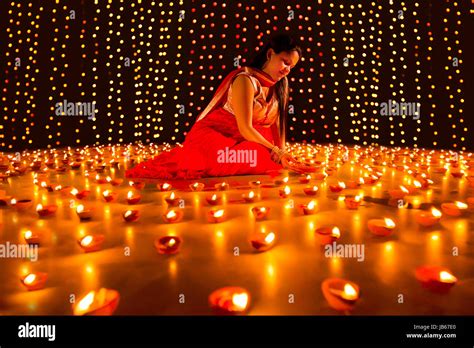 Indian Lady Festival Diwali Home Arranging Diya Worship Stock Photo Alamy