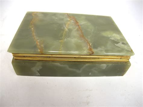 Maybe you would like to learn more about one of these? Vintage Green Onyx Trinket / Jewelry Box | Property Room