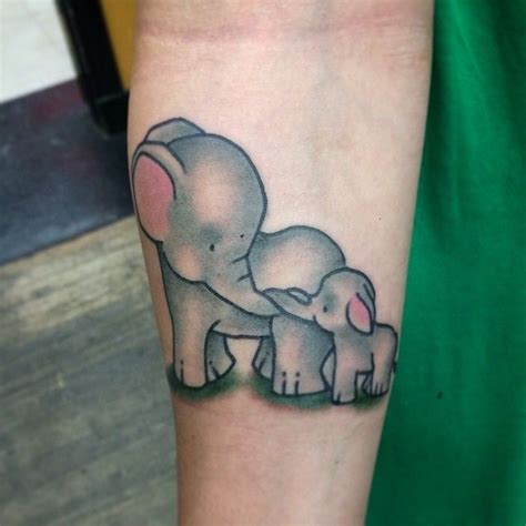 It is the perfect tattoo, which will make you fall in love with elephants over again when. Some Momma and baby elephants | Tattoos for daughters, Baby tattoos, Elephant tattoos