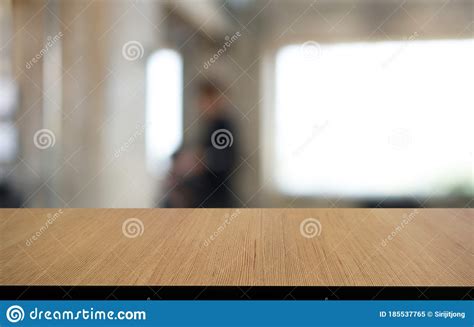Wood Table Top In Blur Background Room Interior With Empty Copy Space