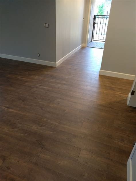 This water resistant, wood based flooring is perfect for bathrooms, basements, and kitchens! Our New Quick Step Reclaime Laminate Flooring (Mocha Oak ...