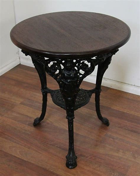 Everyday low prices · curbside pickup · savings spotlights A Victorian cast-iron pub table with circular wooden top ...
