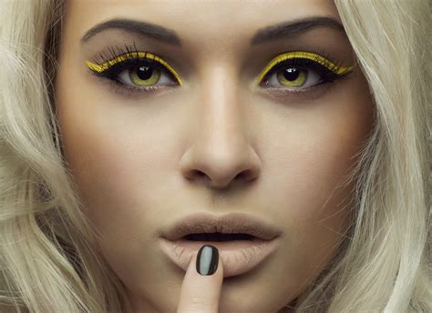 Girl With Yellow Eyes And Make Up