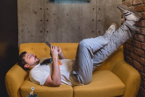 Lazy Guy On Couch Stock Photos Pictures And Royalty Free Images Istock