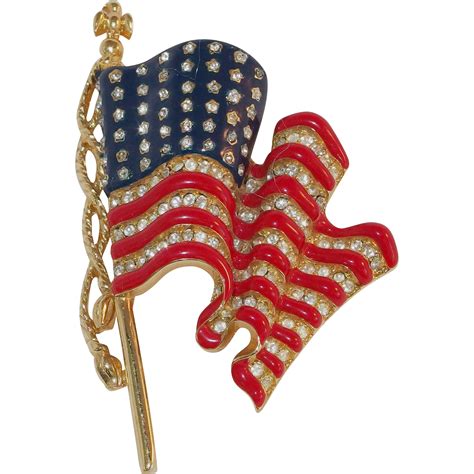 Trifari – Patriotic U.S. waving flag enamel and rhinestone brooch png image