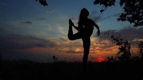 Maybe you would like to learn more about one of these? Silhouette Female Girl Doing Yoga Background of Sunset Sky ...
