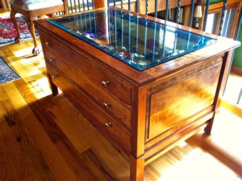 With the extra support of the second pedestal you can find tables that have legs made out of glass along with a glass dining table top which give a contemporary feel to the dining room table. Glass-top display table - Traditional - Hall - Minneapolis ...