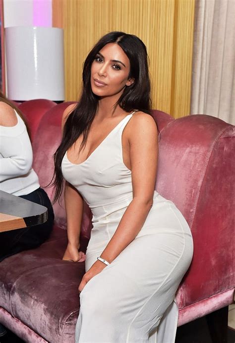 Kim Kardashian Shows Off Her Hourglass Curves In White Dress Photos