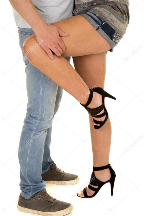 Man Holding Woman Leg Stock Photo By Alanpoulson 60557221