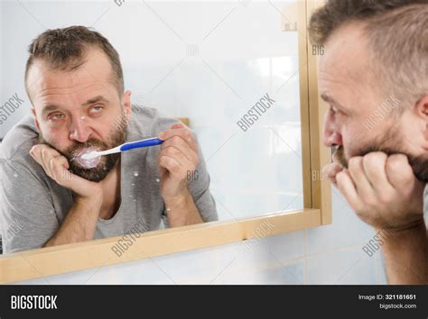 Adult Man Brushing His Image And Photo Free Trial Bigstock
