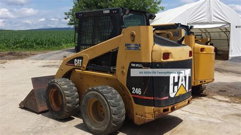 Operating weight, operating specifications and dimensions all based on 75 kg (165 lb) operator, all fluids, single speed, 1524 mm (60 in) dirt bucket outstanding versatility. 2003 Cat Caterpillar 246 Skid Steer Loader Diesel ...