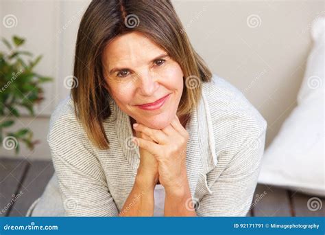 Attractive Older Woman Smiling And Sitting Outside Stock Image Image