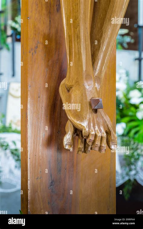 The Detail Of Nailed Feet In A Wood Carved Statue Of The Crucifixion Of