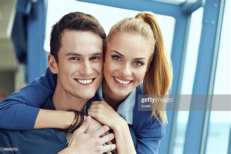 Happy Young Couple High Res Stock Photo Getty Images