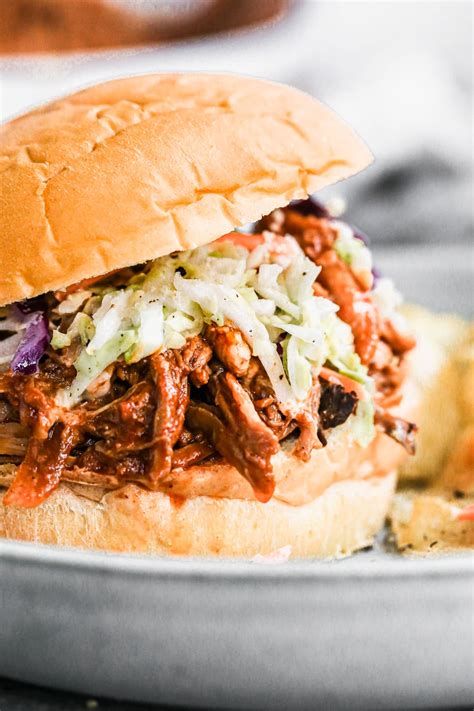 With smoke woven through the moist meat, bits of seasoned crust, and a gentle splash of bbq sauce, bbq pulled pork is a foolproof low and slow smoked food, perfect for feeding large crowds. Award Winning Crockpot Pulled Pork - Crock Pot Pulled Pork ...