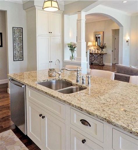 If your cabinets have plastic laminate surfaces, first check with a knowledgeable paint dealer, and test a sample of the paint you wish to use in an inconspicuous area to ensure that it will bond to the material. Giallo Ornamental Granite | Kitchen cabinet design ...