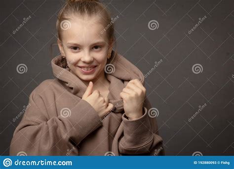 Hild Girl With Long Hair Gathered In A Bun Stock Image Image Of Skin