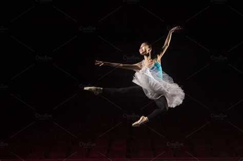One Ballerina Jumping In Air Stage High Quality Sports Stock Photos