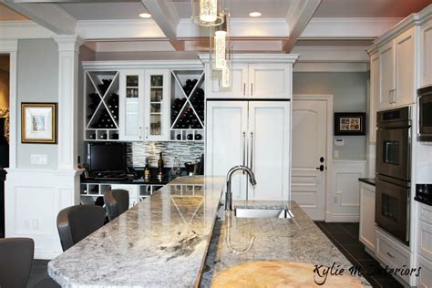The diamond cabinets that were purchased from lowes are a warm grey and are accented with champagne gold atlas cabinet hardware. Kitchen Ideas: Decorating with White Appliances / Painted Cabinets - Kylie M Interiors