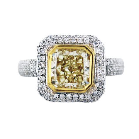 Solitaire engagement ring with a 1/2 carat tw diamond in 14ct yellow & white gold. Fancy Yellow Cushion Cut Diamond Engagement Ring in 18K ...