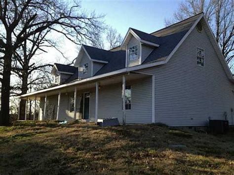 Josh duggar is in custody in arkansas. PHOTOS Why is Josh and Anna Duggar's house for sale ...