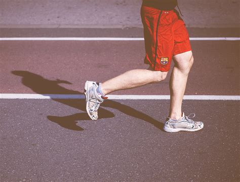 Legs Of Man Running On The Track High Quality Free Stock Images