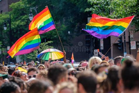 Gay Rainbow Flags Waving Above Blurred Crowd Editorial Photography