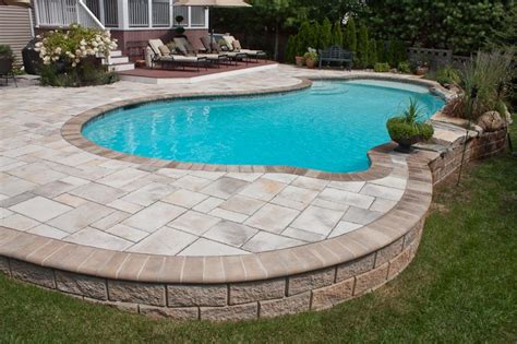 They are aesthetically more pleasing than above ground pools as you can add features such as decking or pavers to create the appearance of an inground pool but still have a lower cost to build and maintain. Gunite Pools Gallery - Northern Pool & Spa - ME, NH, MA