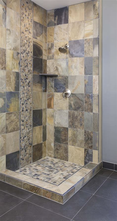 This rustic bathroom design employs a cabin in the woods kind of style. Rustic modern slate shower #thetileshop | Bathroom ...