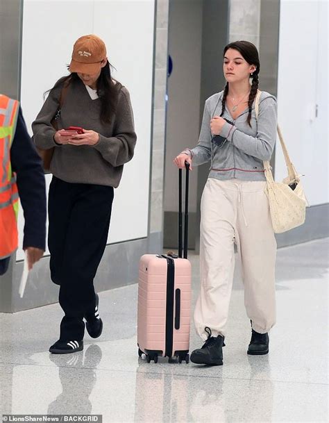 katie holmes and lookalike daughter suri cruise are spotted on rare outing together in la ny